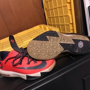 Navy and red Nike shoes